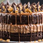 Chocolate Peanut Butter Salted Caramel Toffee Cake on a plate