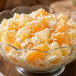 Bowl of ambrosia with oranges and coconut