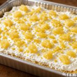 Mandarin orange cake with pineapple cream topping