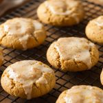 Soft orange pumpkin cookies with glaze