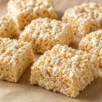 Rice cereal marshmallow squares on parchment